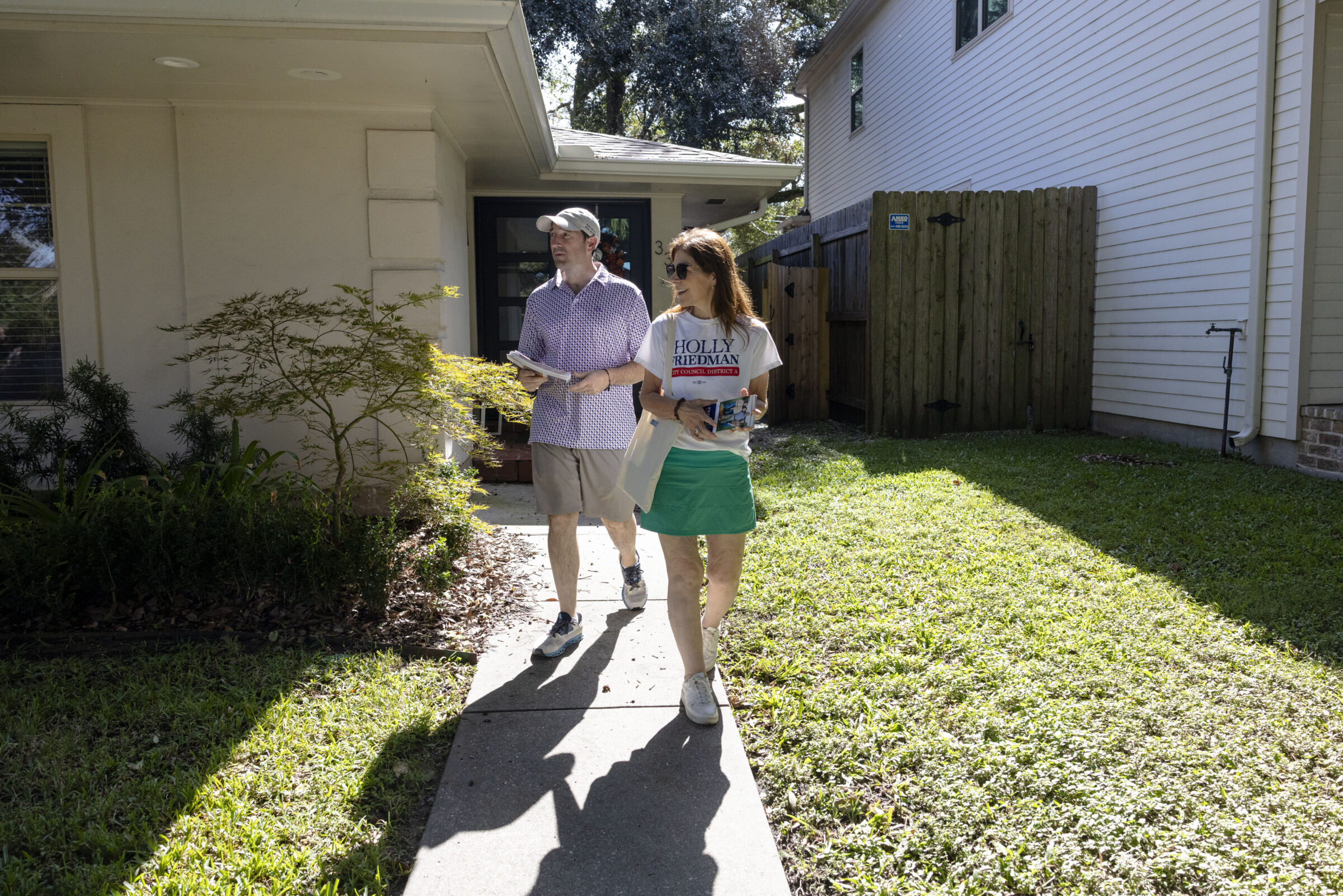 City Council District A candidate Holly Friedman, right, canvases with Gabriel Janusa in Lakeview on October 26, 2025.