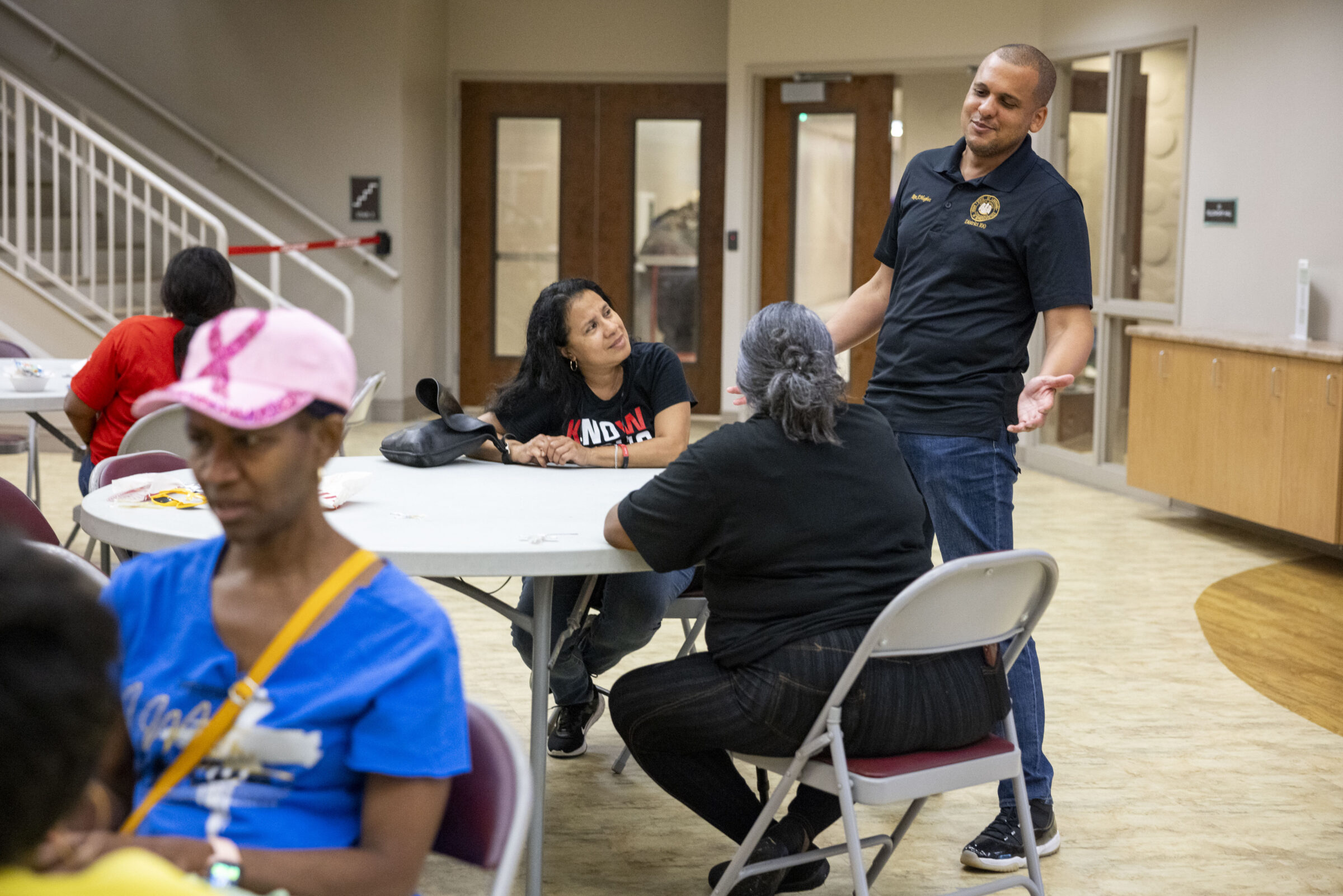 City Council candidate for District E John Hughes chats with constituents during Fall Fest at the Franklin Avenue Baptist Church, where he's a member, in New Orleans East on October 25, 2025.