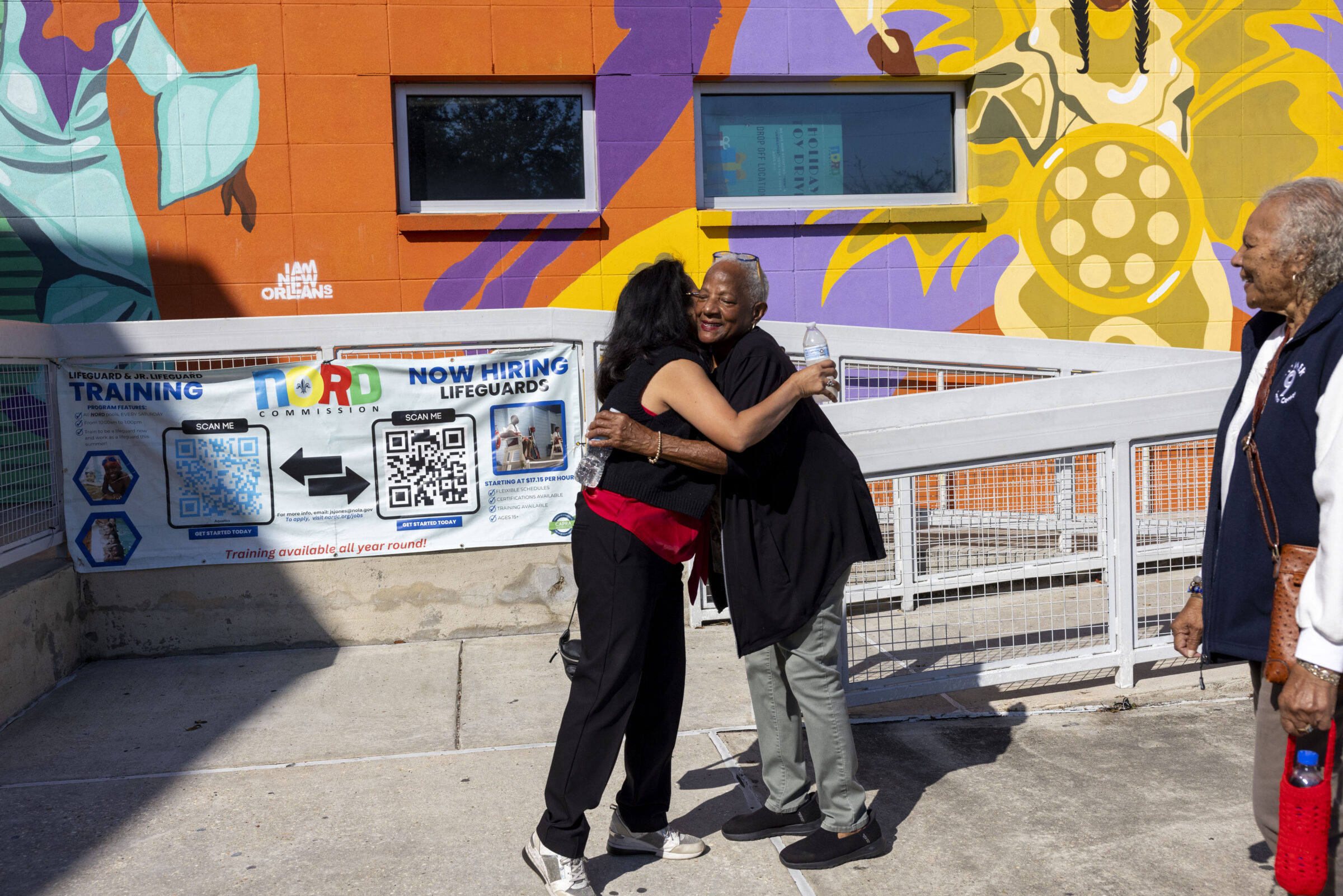 City Council District E candidate Cyndi Nguyen greets a constituent at the Andrew P. Sanchez & Copelin-Byrd Multi-Service Center in the Lower 9th Ward on October 28, 2025.